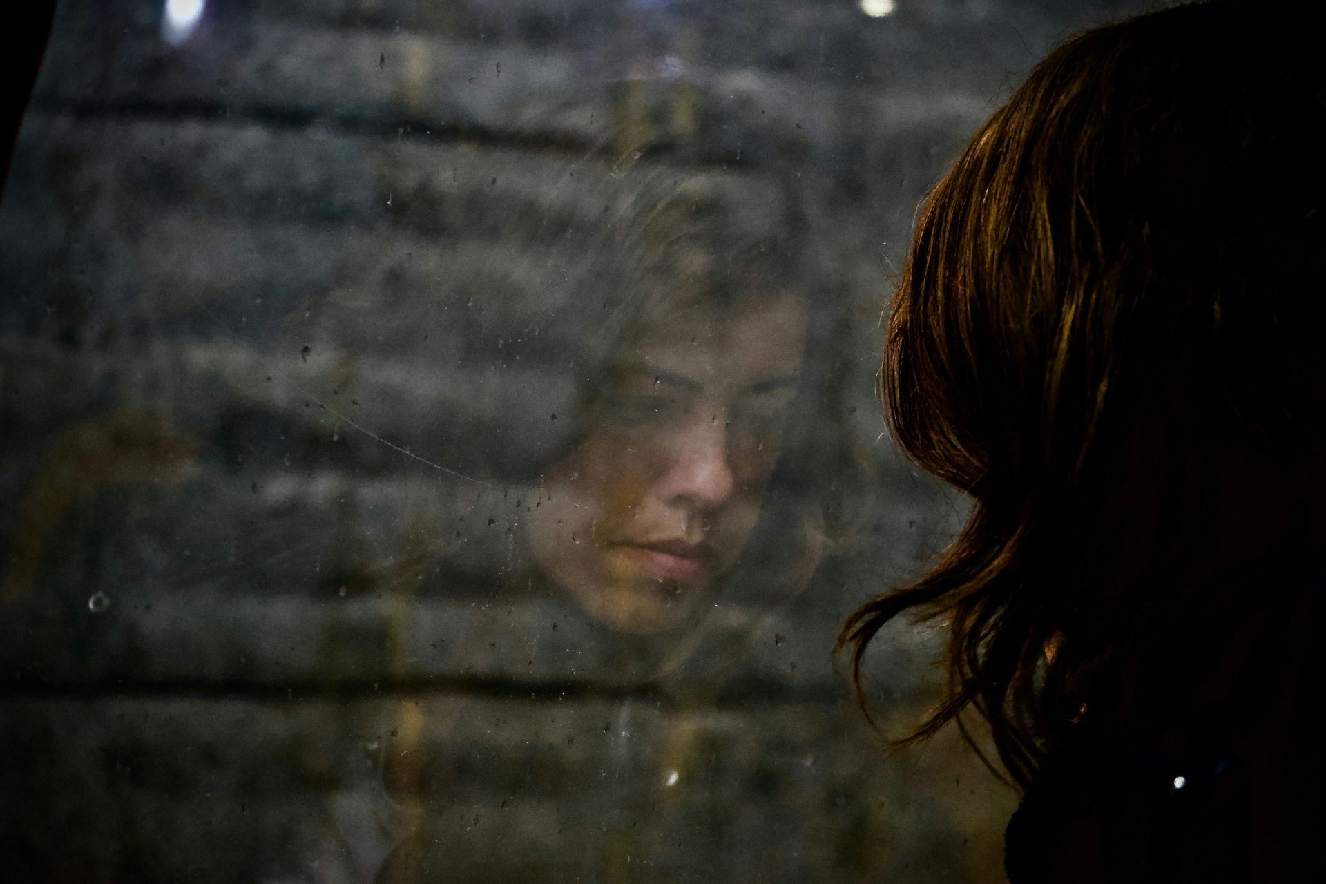 woman looking at the floor